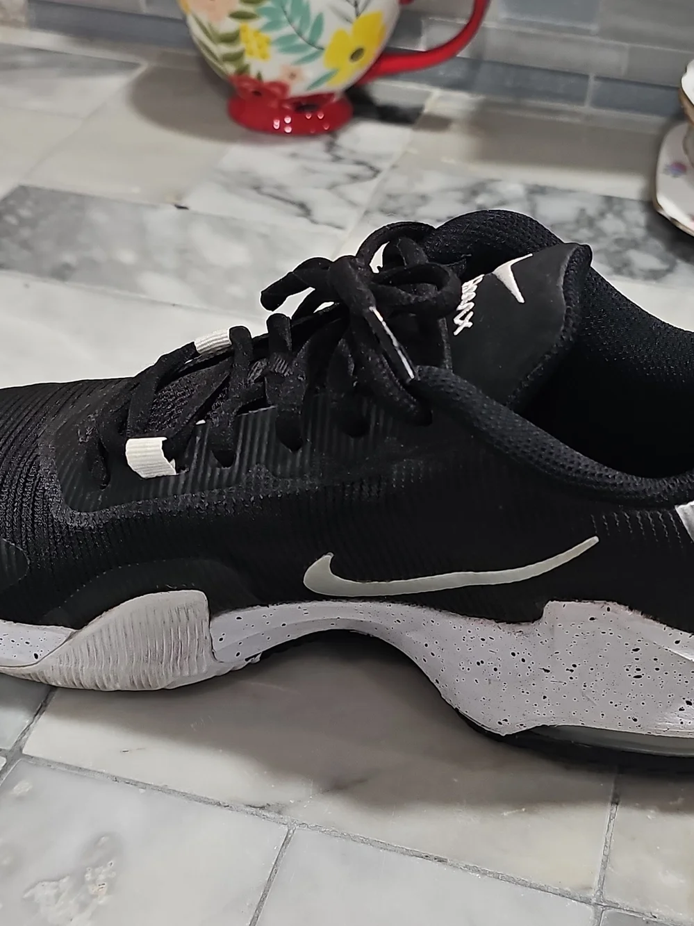 Nike AirMax Impact 4 Men’s Black and White Low-Top Athletic Sneakers